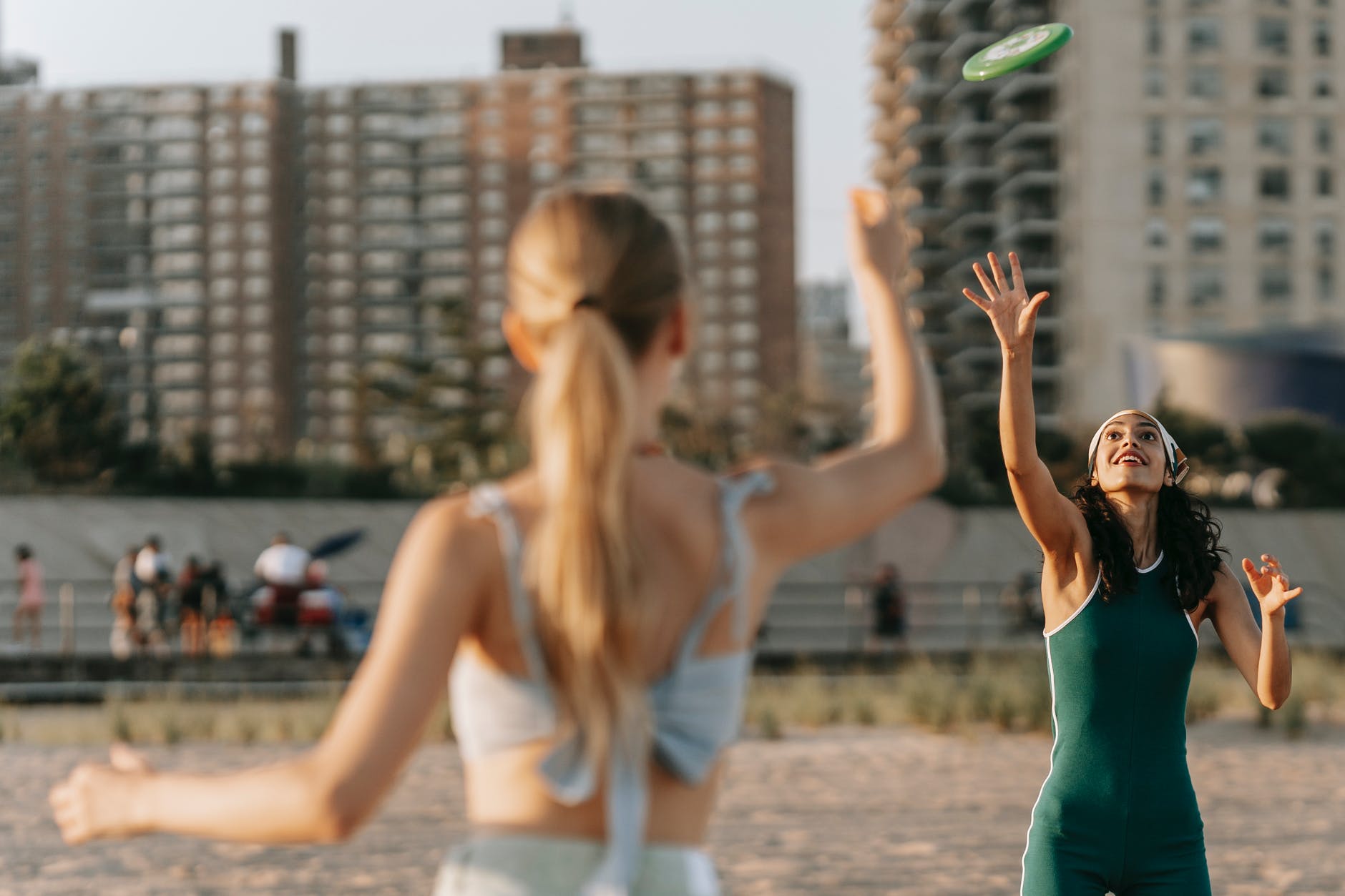 women playing frisbee