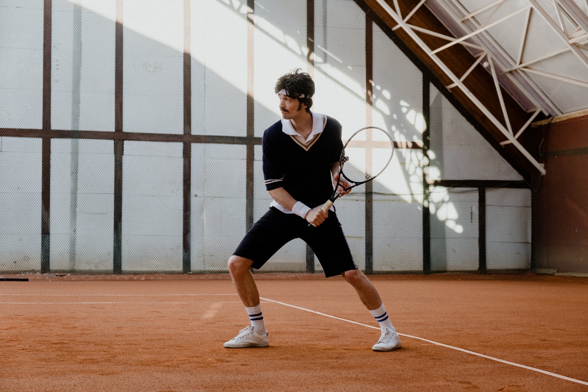 a man playing tennis