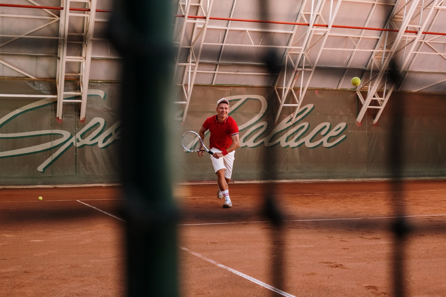 a man in red polo shirt